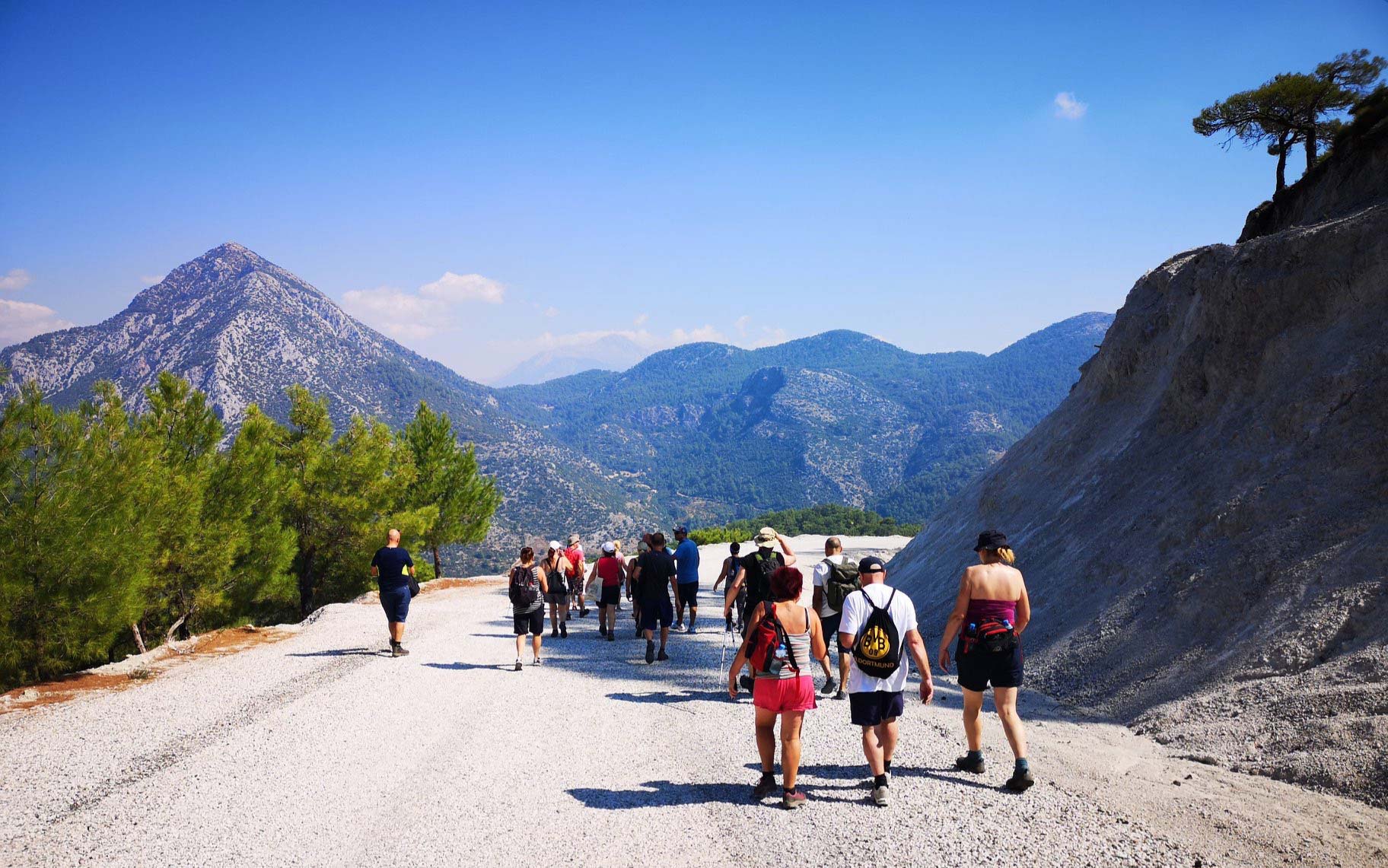 Photo showing a group walking in the Fethiye Mugla region in Turkey