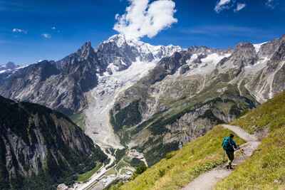 A hiker on the trail on the Tour du Mont Blanc